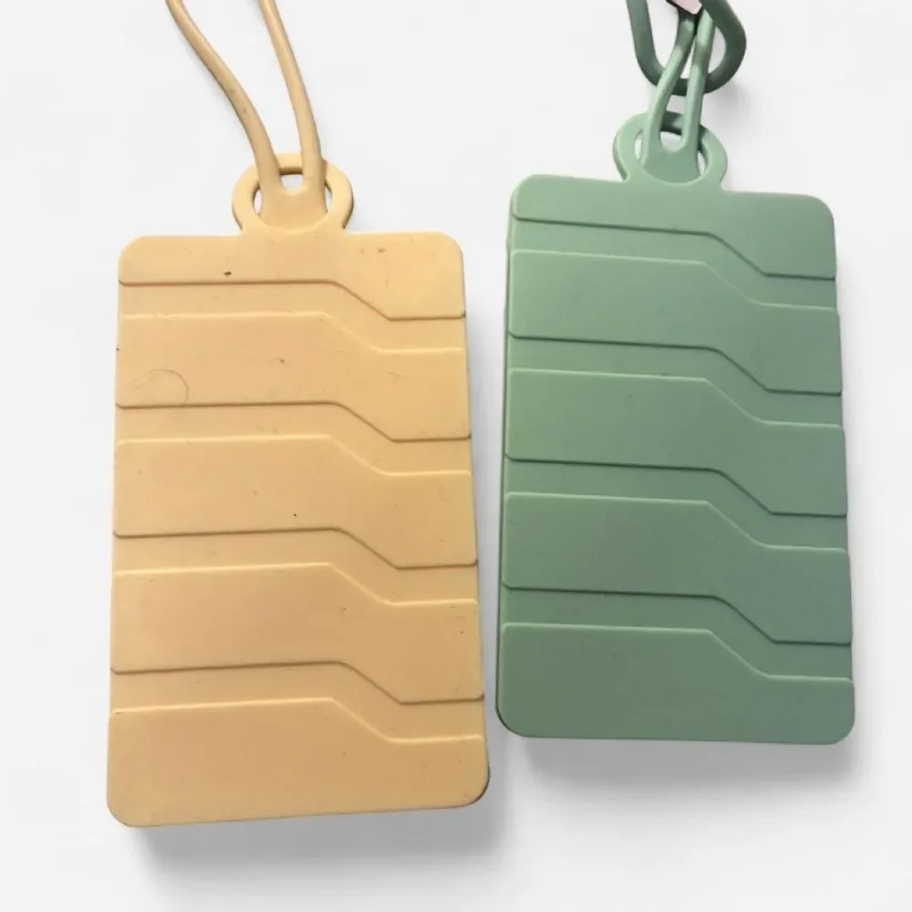 Two NWT Luggage Tags